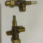 Robinete con válvula de seguridad y porta pico